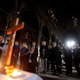 An Iraqi priest holds the first mass at the Grand Immaculate Church since it was recaptured from Islamic State in Qaraqosh